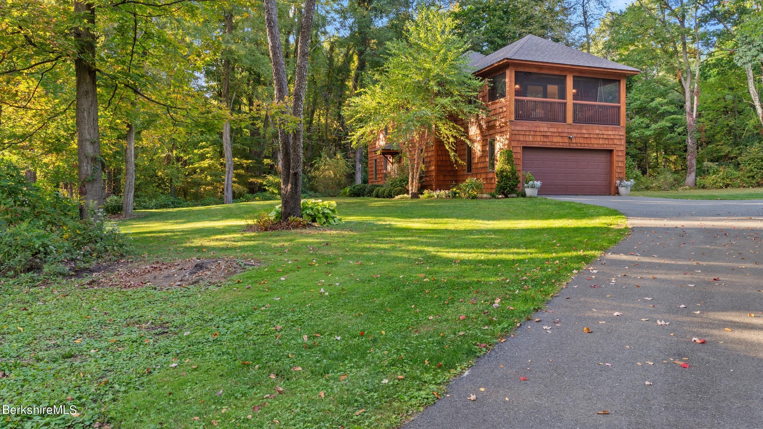188 Hillsdale Road Egremont, MA 01230 - Photo 22 of 32 a front view of a house with a yard