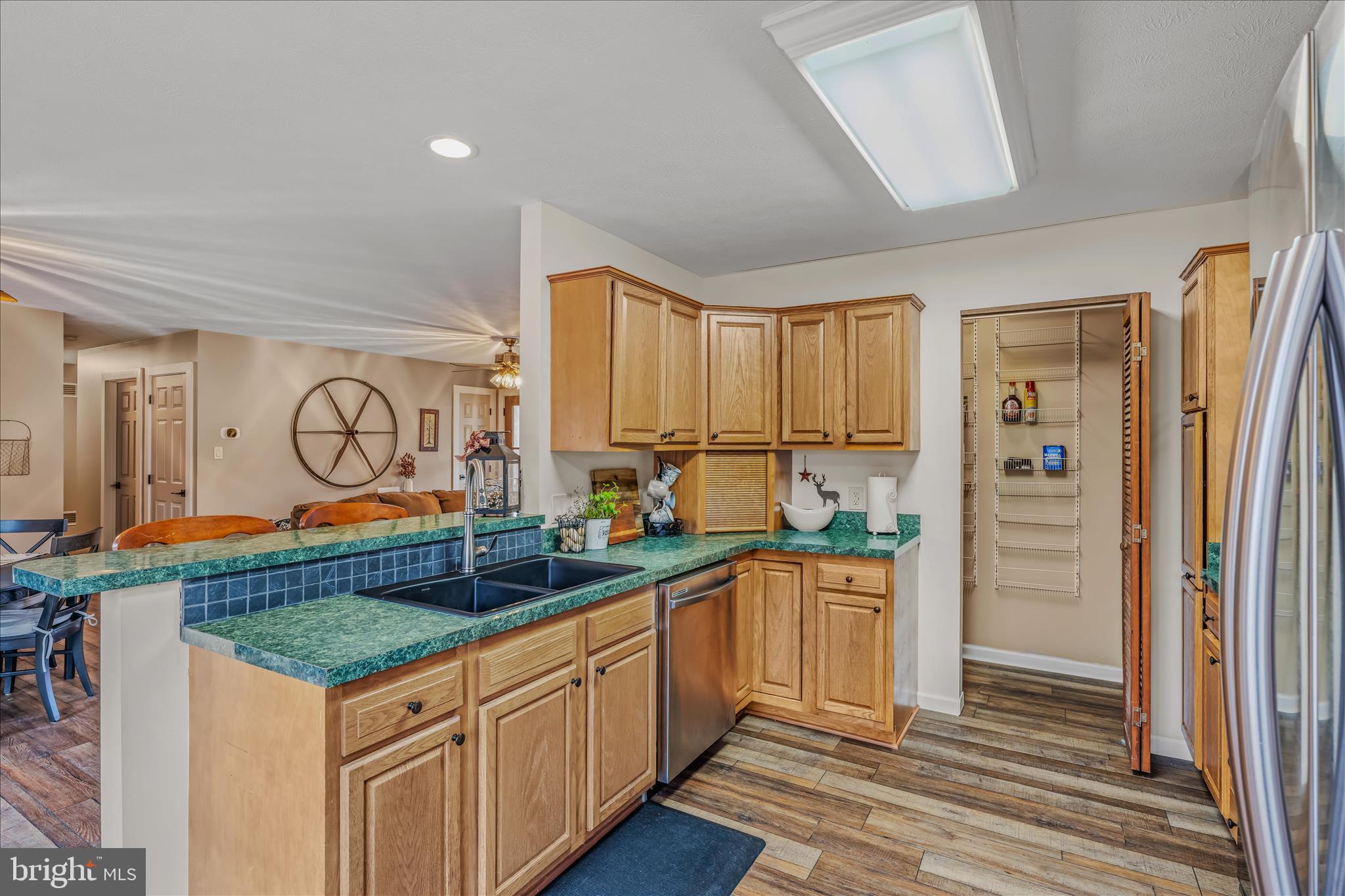 1636 Eckerd Lane Berkeley Springs, WV 25411 - Photo 21 of 85 a kitchen with stainless steel appliances granite countertop a stove a refrigerator and a refrigerator
