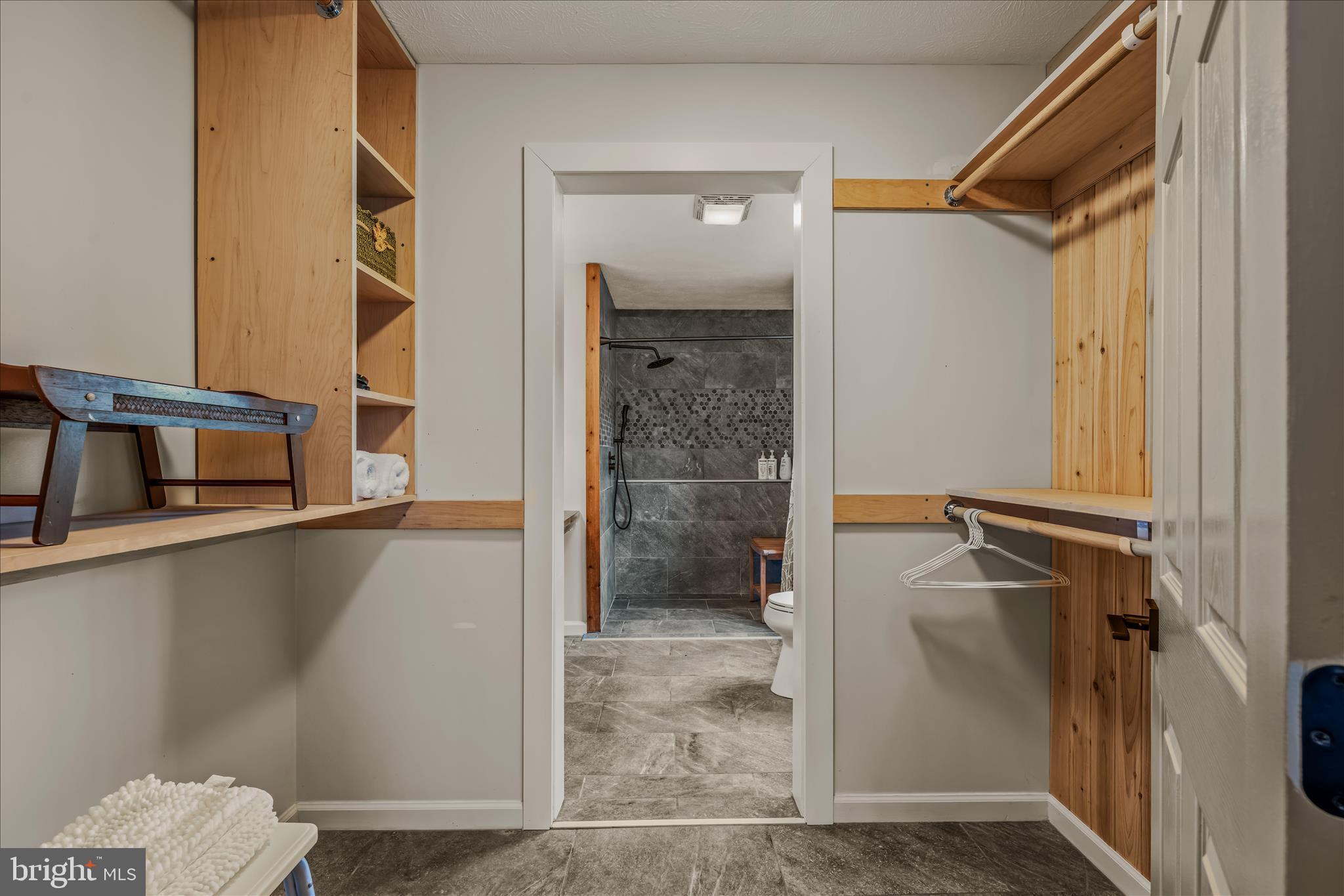 1636 Eckerd Lane Berkeley Springs, WV 25411 - Photo 37 of 85 a bathroom with a sink and a mirror