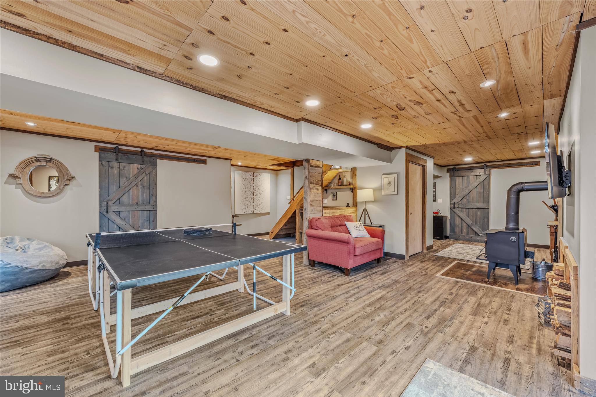 1636 Eckerd Lane Berkeley Springs, WV 25411 - Photo 45 of 85 a bedroom with furniture and a wooden floor