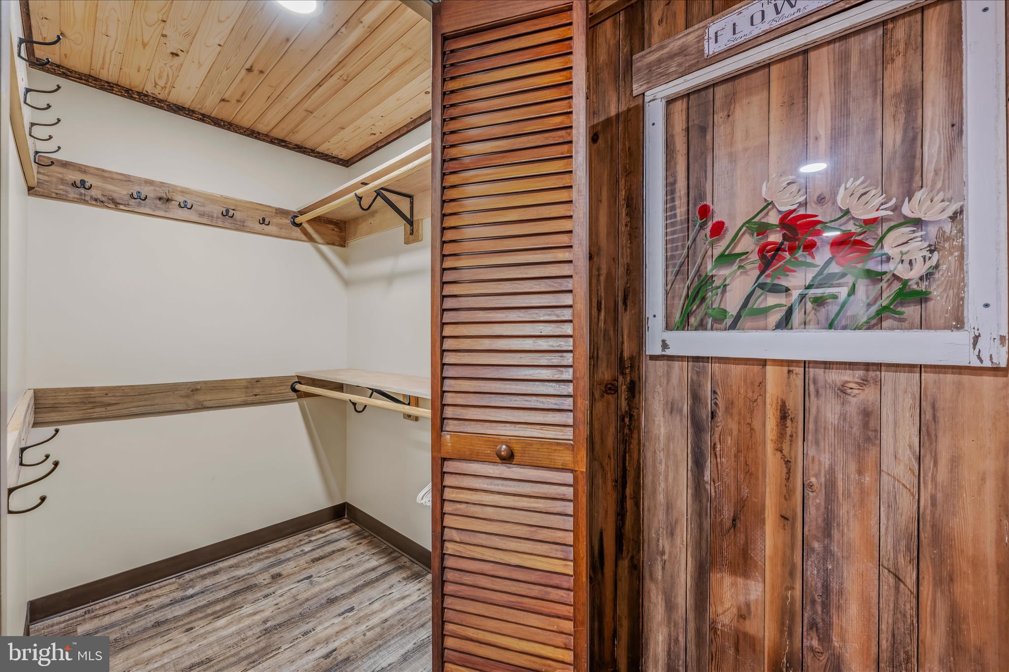 1636 Eckerd Lane Berkeley Springs, WV 25411 - Photo 58 of 85 a view of a room with wooden floor and cabinet