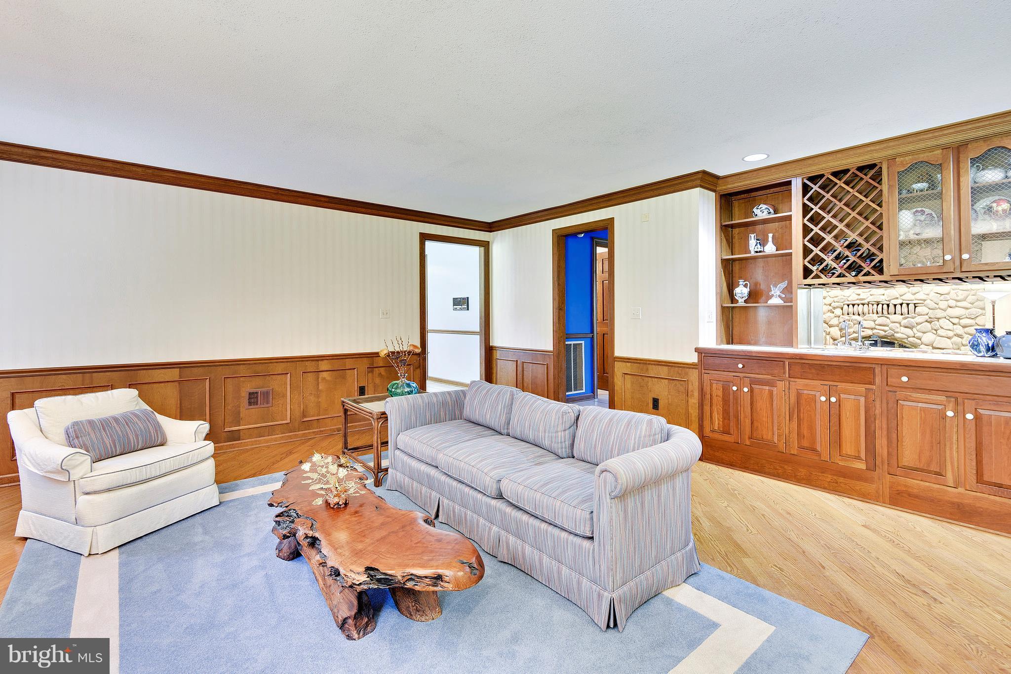 17 Bryants Nursery Road Silver Spring, MD 20905 - Photo 15 of 30 Spacious family room with custom wet bar)