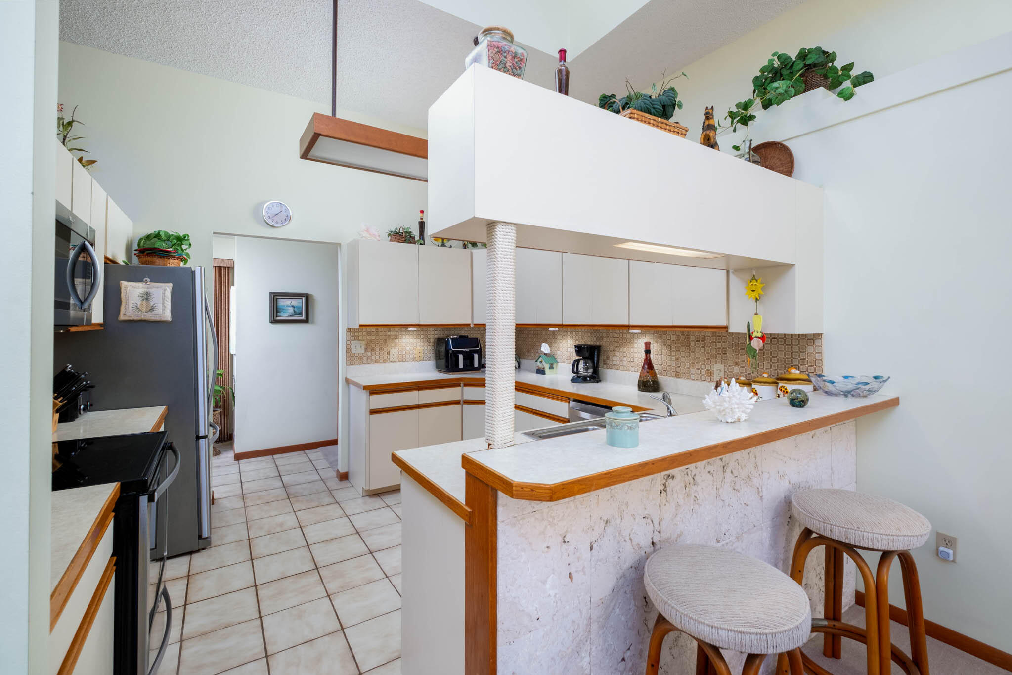 216 Sonny Road Tavernier, FL 33070 - Photo 10 of 49 a kitchen with a sink appliances and cabinets