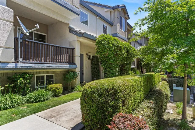 a house view with a garden space