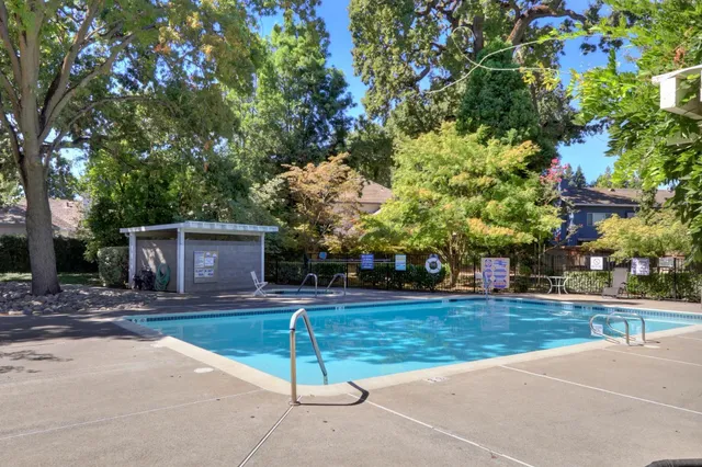 a house with trees in front of it