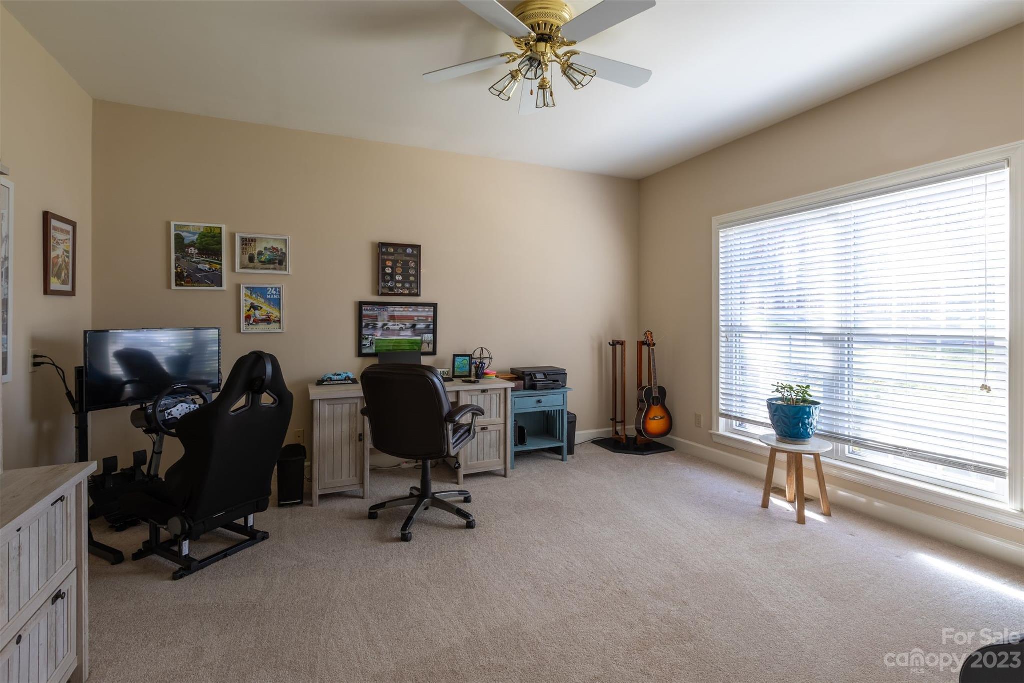 1378 Braeburn Road Northwest Concord, NC 28027 - Photo 12 of 36 a view of a workspace with furniture and a window