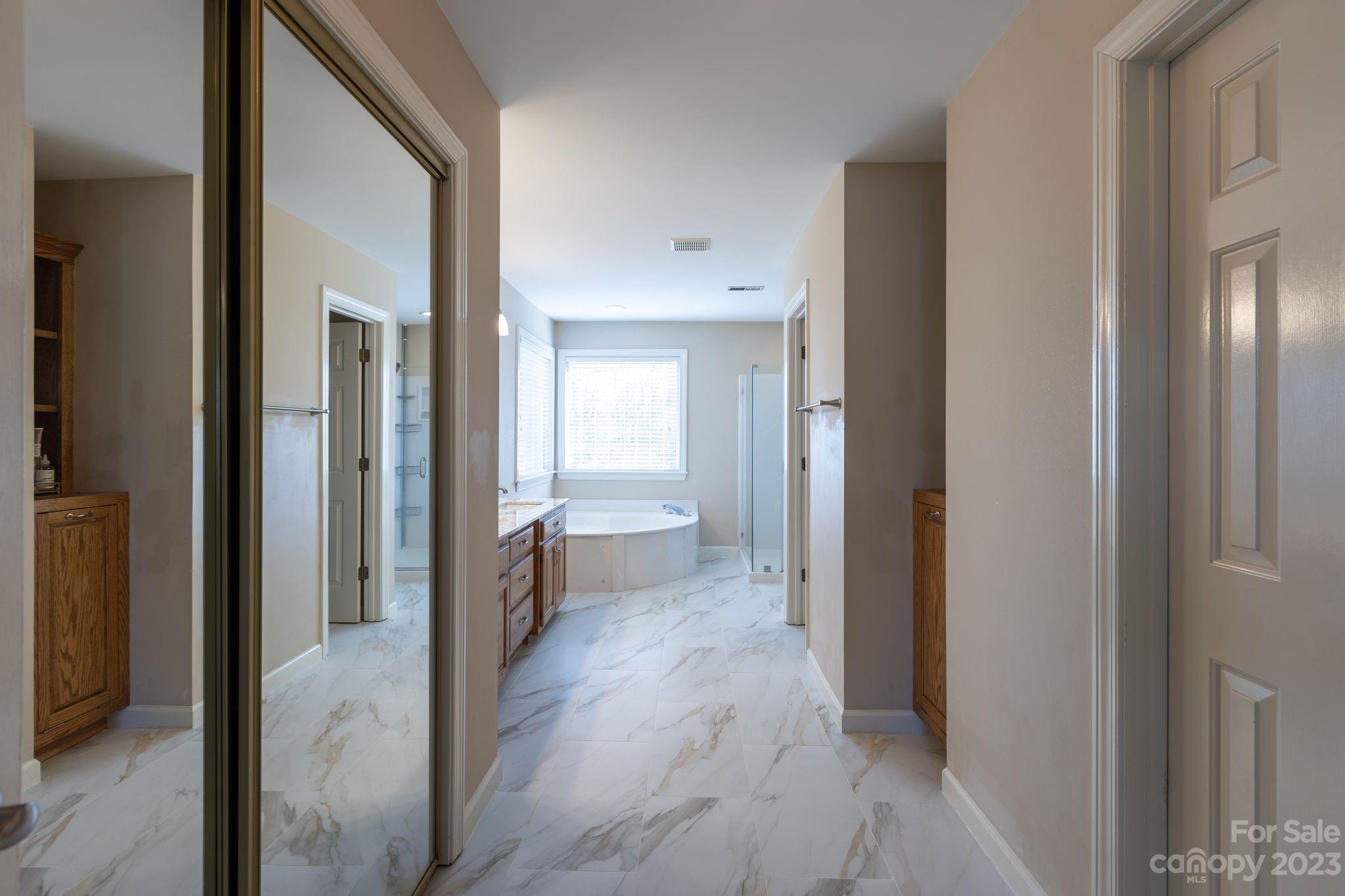 1378 Braeburn Road Northwest Concord, NC 28027 - Photo 24 of 36 a view of a bathroom from the hallway