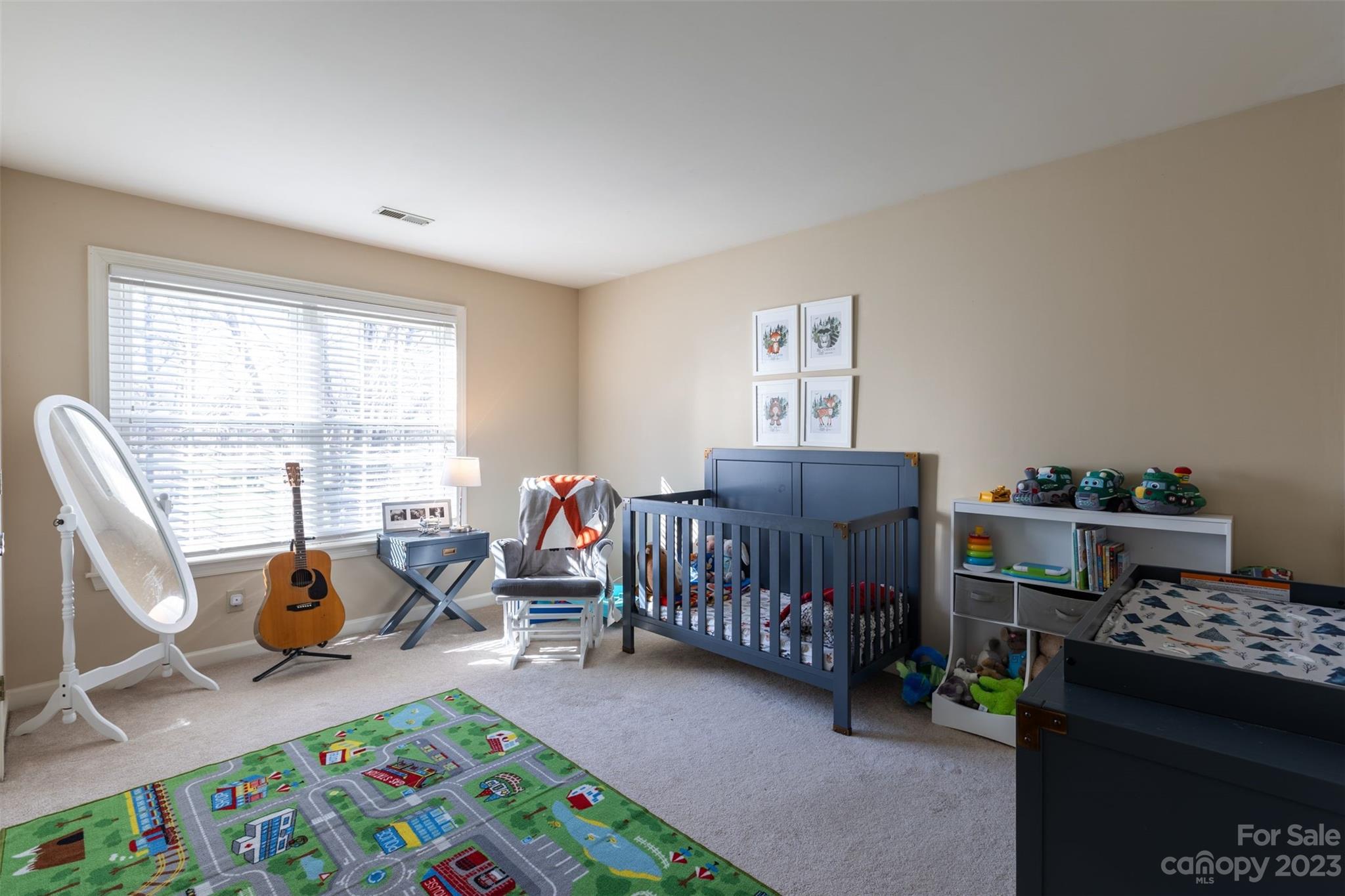 1378 Braeburn Road Northwest Concord, NC 28027 - Photo 27 of 36 a bedroom with furniture and a window