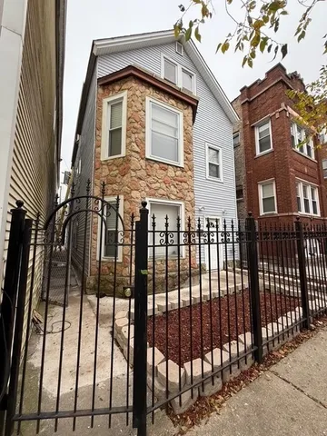 a front view of a house with a balcony