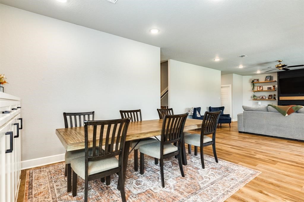 628 Greystone Lane Angleton, TX 77515 - Photo 17 of 33 a view of a dining room with furniture