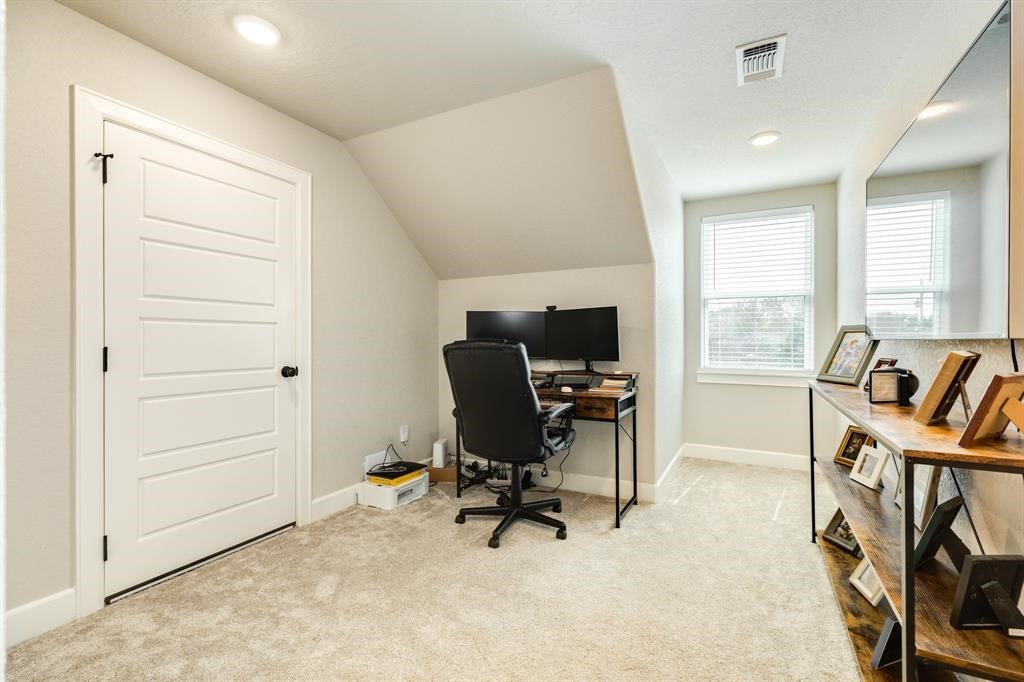 628 Greystone Lane Angleton, TX 77515 - Photo 26 of 33 a view of a workspace with furniture and a window