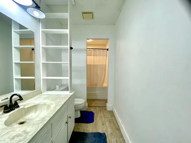 a bathroom with a sink and a bathtub