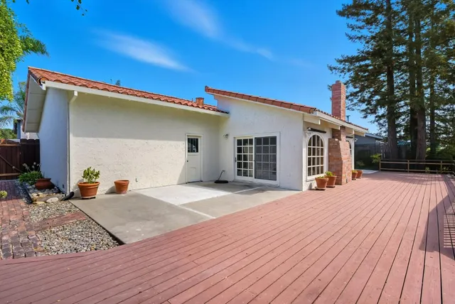 a porch with seating space and yard