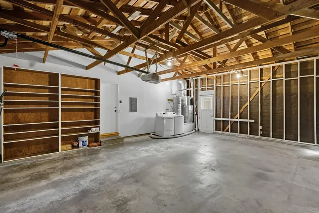 a view of a room with wooden walls