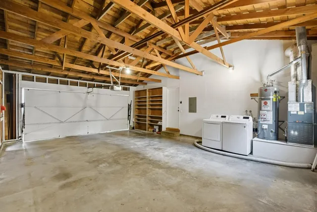 a view of a room with wooden walls