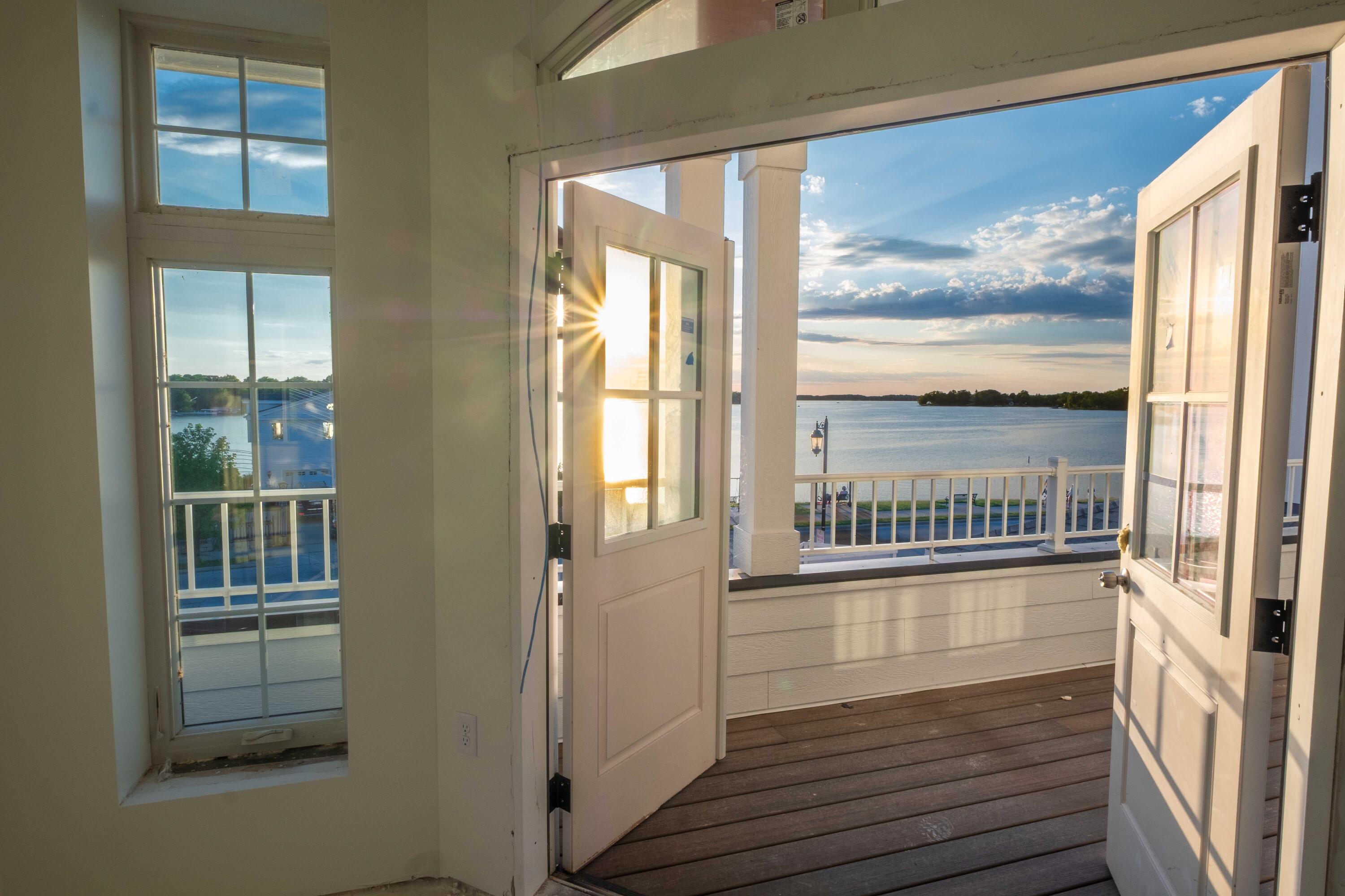 503 North Lake Road, Unit 1 Oconomowoc, WI 53066 - Photo 5 of 23 View from Sunroom
