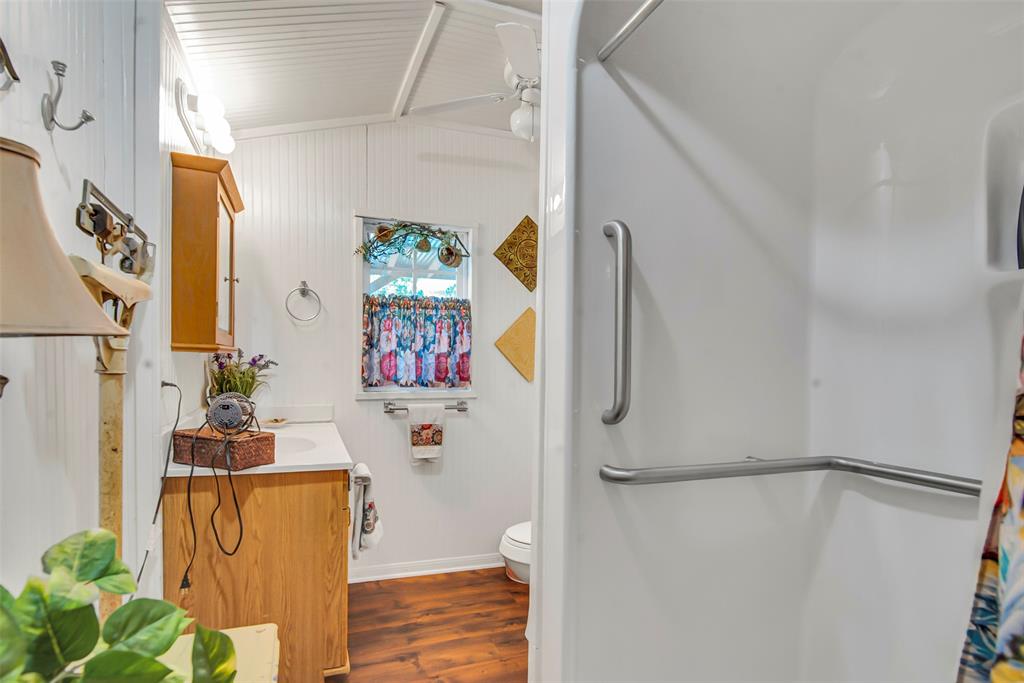 182 Douglas Street Van Alstyne, TX 75495 - Photo 14 of 23 a bathroom with a shower