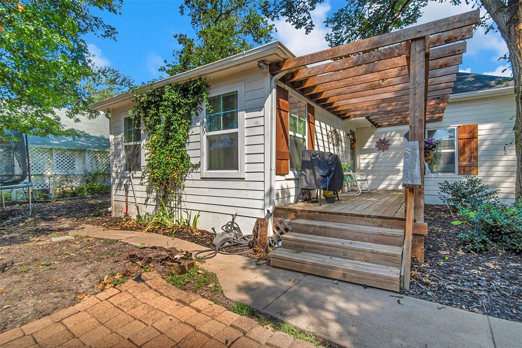 182 Douglas Street Van Alstyne, TX 75495 - Photo 3 of 23 a view of a house with backyard and sitting area