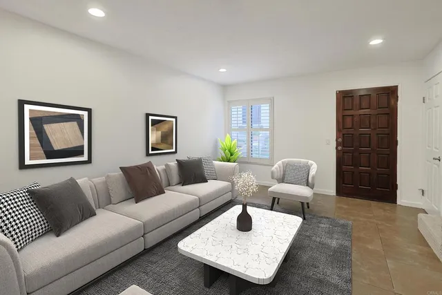 a living room with furniture and a rug