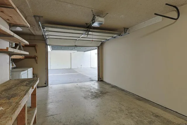 a view of a kitchen with a sink