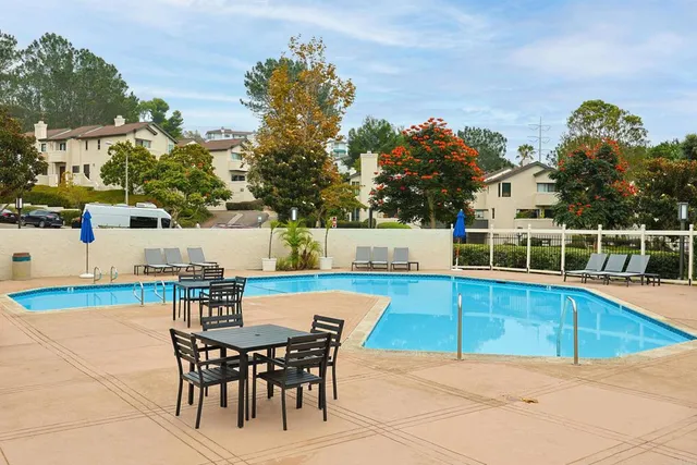 a view of a chairs and table on the terrace