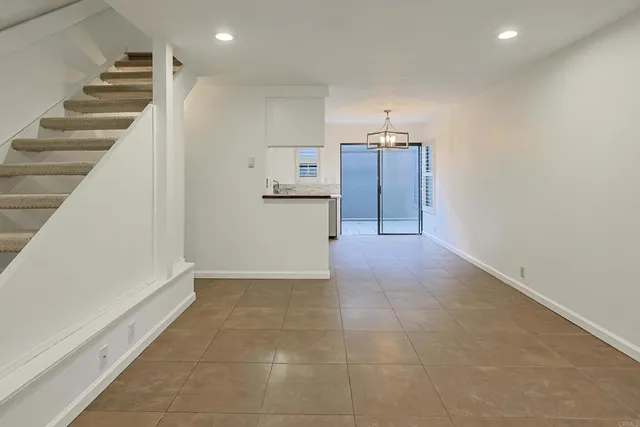 a view of a kitchen with a sink