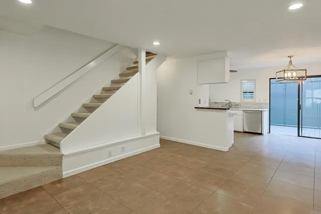 a view of a kitchen with electric appliances