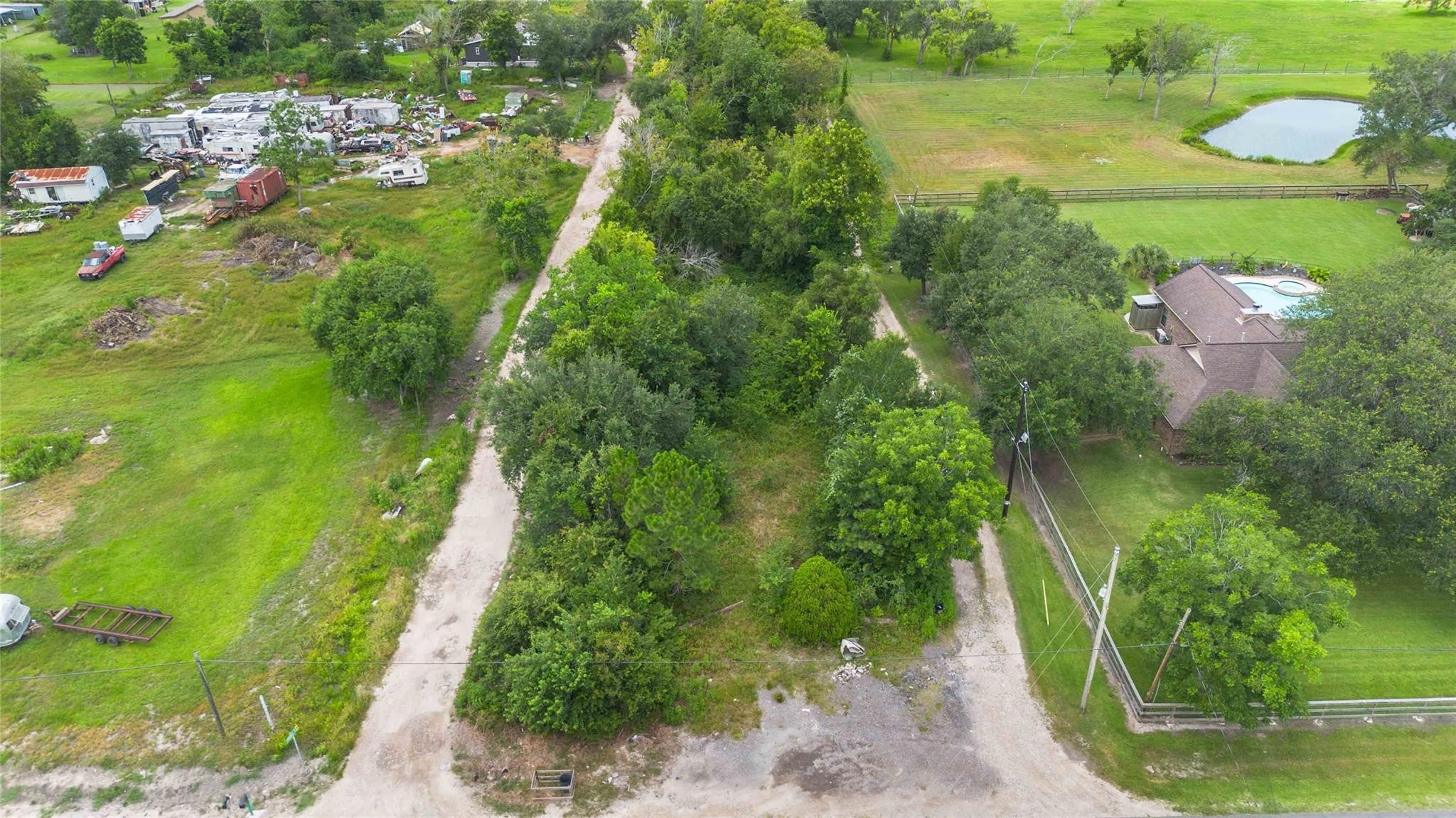 15601 Fir Road Santa Fe, TX 77517 - Photo 2 of 9 a view of a lake view