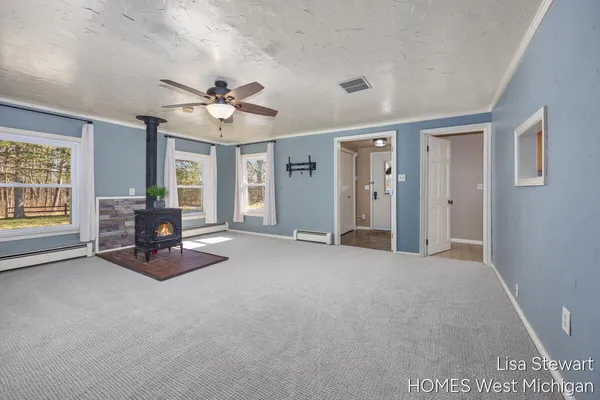 $385,000 | 4011 Buttrick Avenue Southeast, Ada, MI 49301