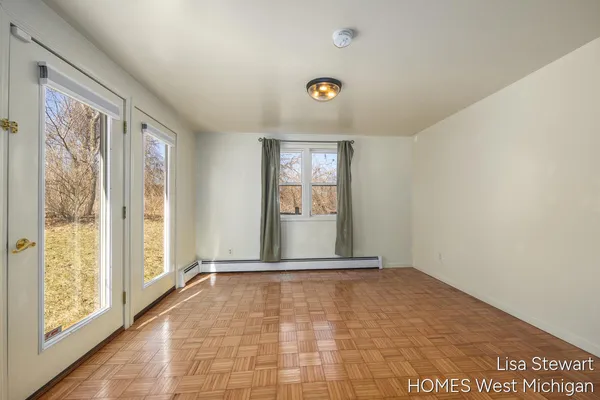 $385,000 | 4011 Buttrick Avenue Southeast, Ada, MI 49301