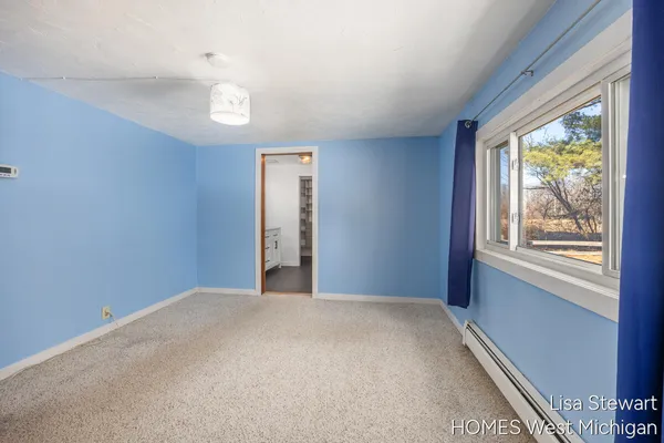 $385,000 | 4011 Buttrick Avenue Southeast, Ada, MI 49301