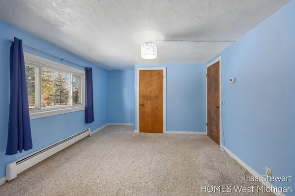 $385,000 | 4011 Buttrick Avenue Southeast, Ada, MI 49301