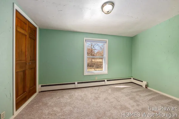 $385,000 | 4011 Buttrick Avenue Southeast, Ada, MI 49301