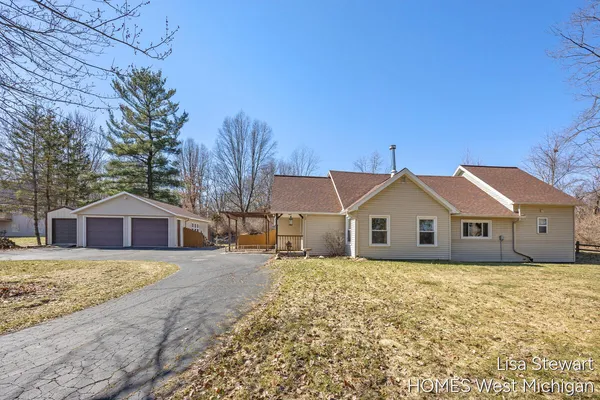 $385,000 | 4011 Buttrick Avenue Southeast, Ada, MI 49301