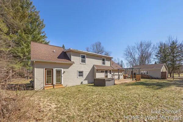 $385,000 | 4011 Buttrick Avenue Southeast, Ada, MI 49301