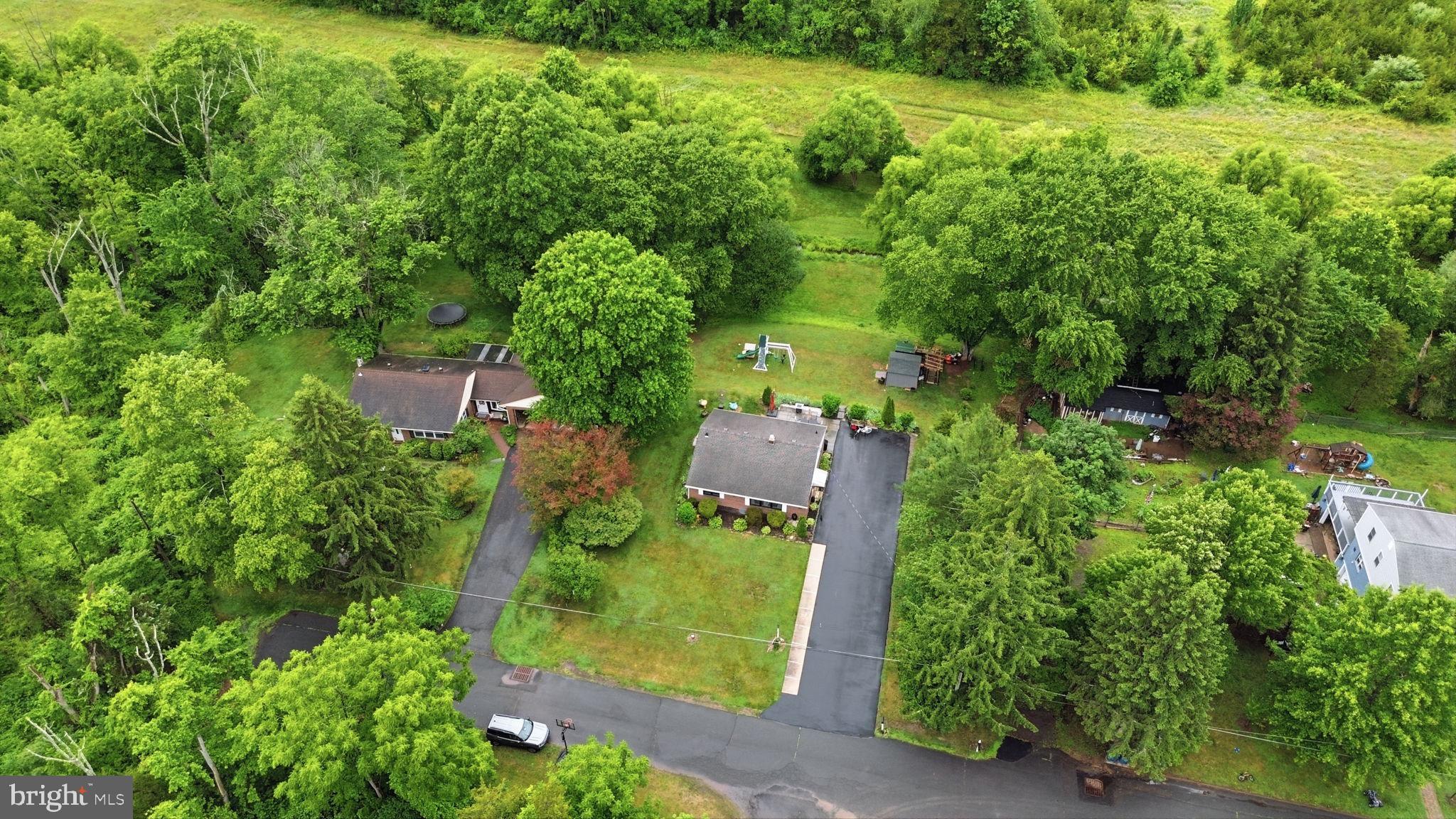 20 Poplar Road Ringoes, NJ 08551 - Photo 40 of 44 Serene homes nestled in lush greenery.