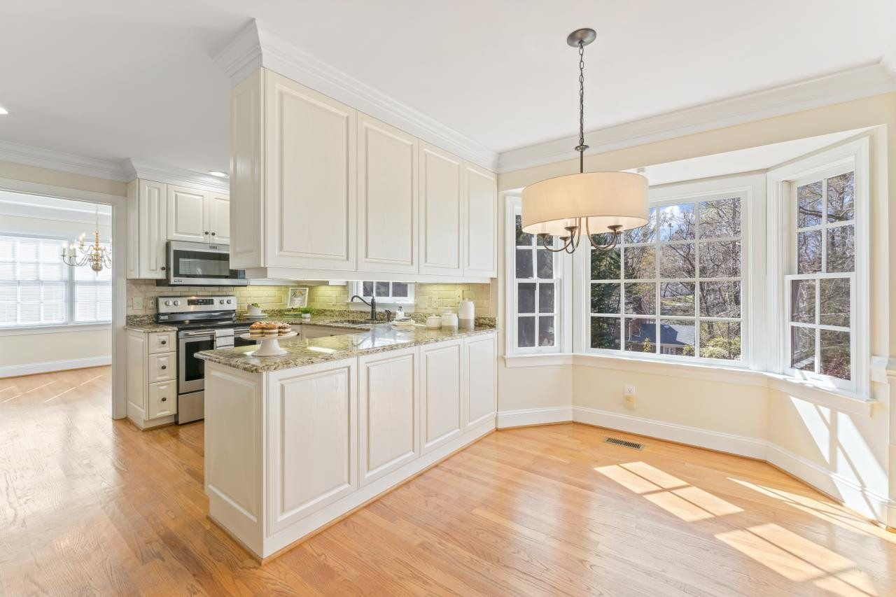 5013 Trail Ridge Drive Raleigh, NC 27613 - Photo 11 of 32 The kitchen, breakfast area and family room are an open space together. All three are spacious and flow nicely with the front of the home. Kitchen