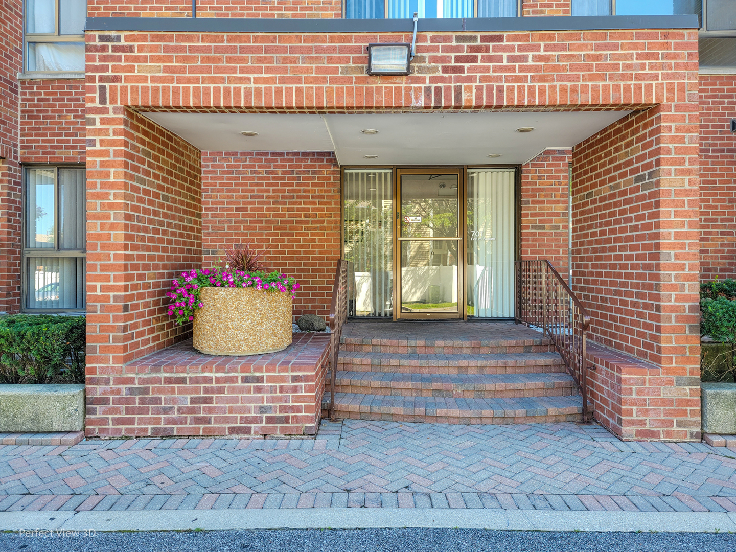 701 Forum Square, Unit 307 Glenview, IL 60025 - Photo 2 of 22 a front view of a house with entryway