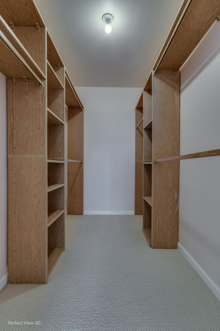 701 Forum Square, Unit 307 Glenview, IL 60025 - Photo 11 of 22 a view of an empty walk in closet