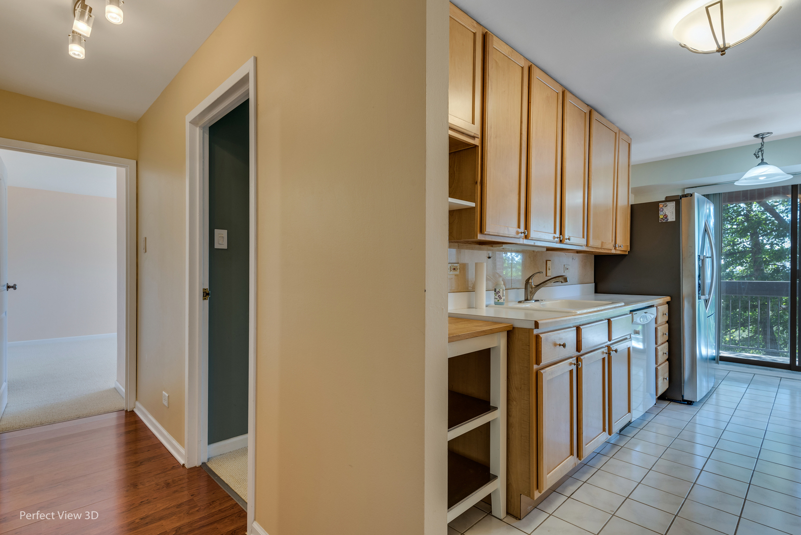 701 Forum Square, Unit 307 Glenview, IL 60025 - Photo 4 of 22 a kitchen with a sink stove and cabinets