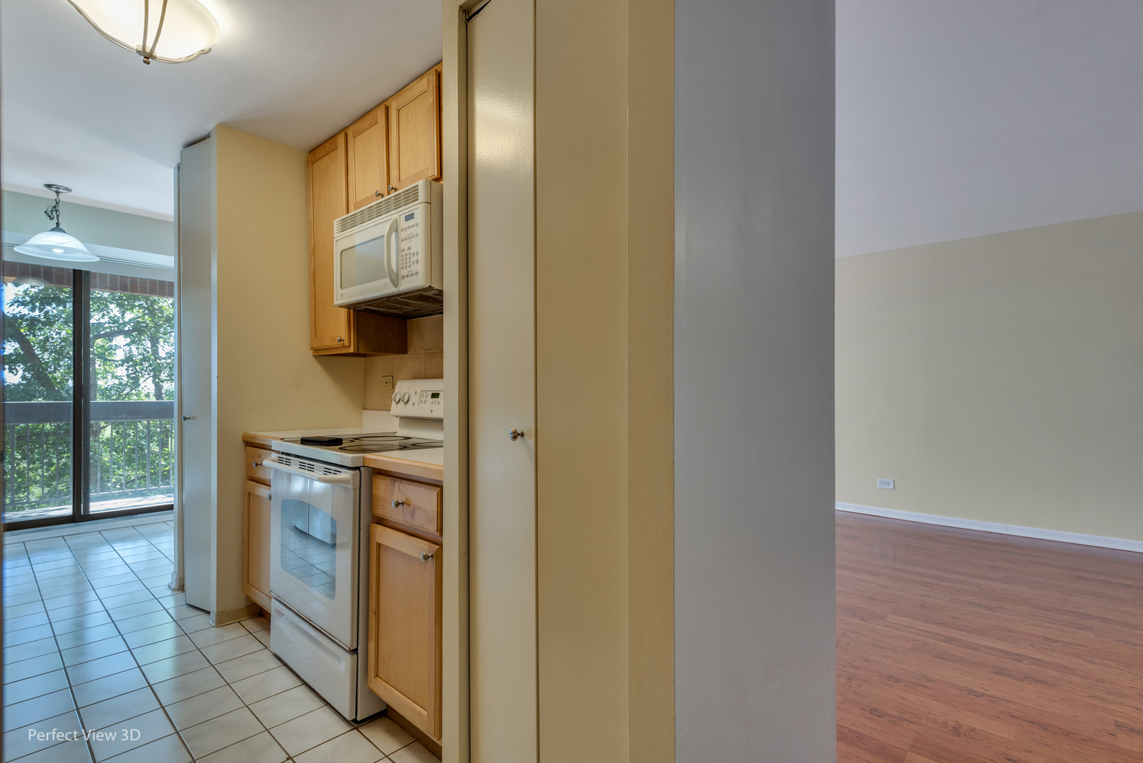 701 Forum Square, Unit 307 Glenview, IL 60025 - Photo 5 of 22 a kitchen with stainless steel appliances granite countertop a stove and a refrigerator