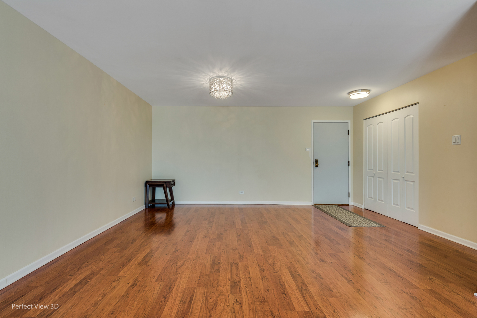 701 Forum Square, Unit 307 Glenview, IL 60025 - Photo 10 of 22 a view of a room with wooden floor and a bench