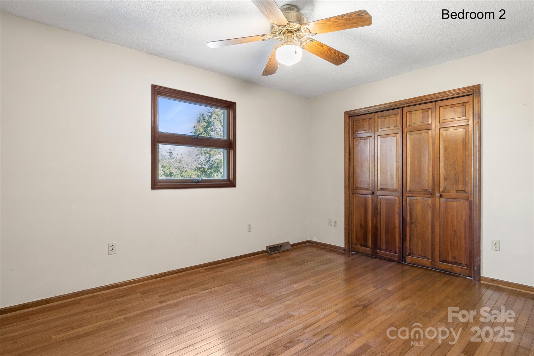5303 Rogers Road Monroe, NC 28110 - Photo 24 of 45 a view of an empty room with wooden floor