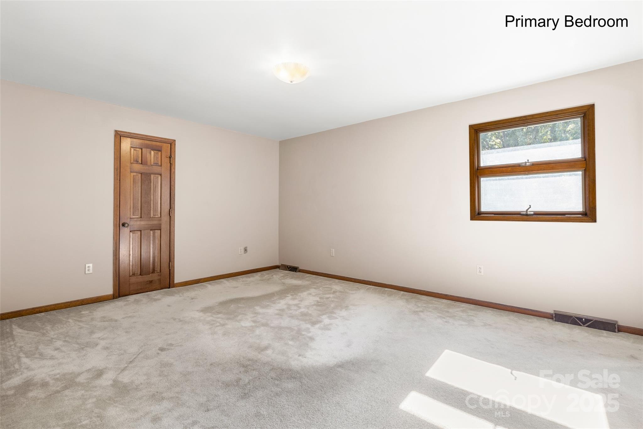 5303 Rogers Road Monroe, NC 28110 - Photo 25 of 45 an empty room with windows