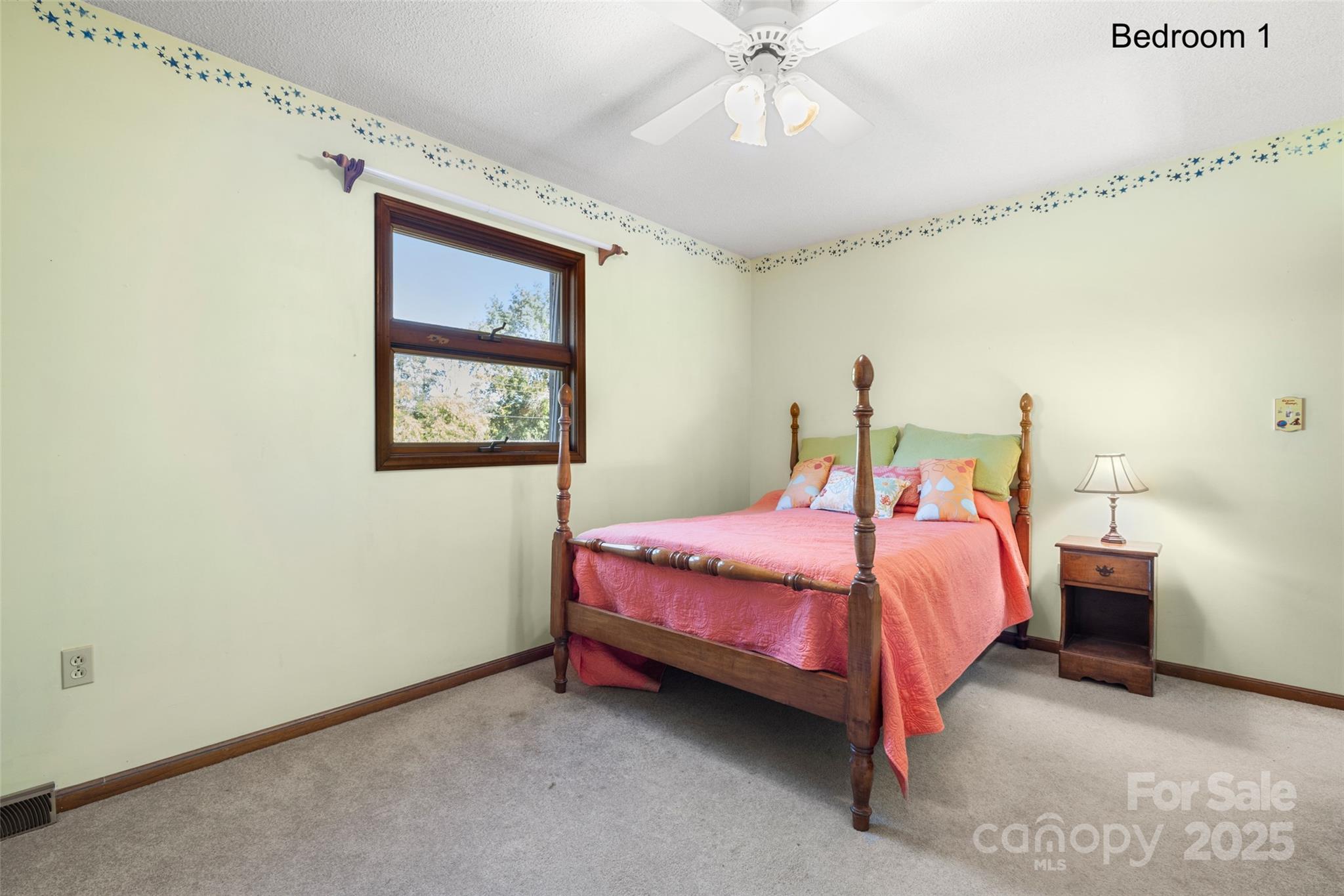 5303 Rogers Road Monroe, NC 28110 - Photo 26 of 45 a bedroom with a bed chandelier and a window