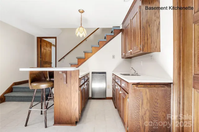 a kitchen with a sink and cabinets