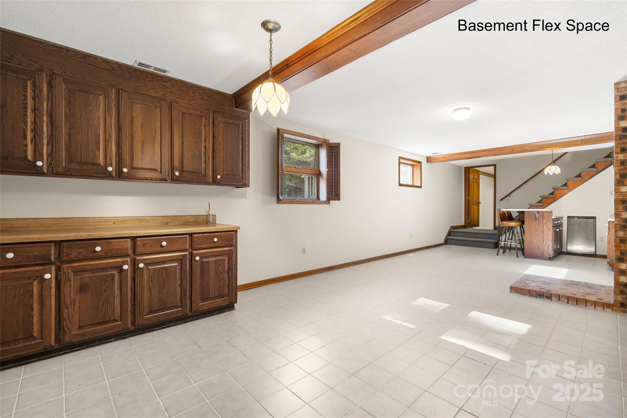 5303 Rogers Road Monroe, NC 28110 - Photo 30 of 45 a kitchen with a sink and cabinets