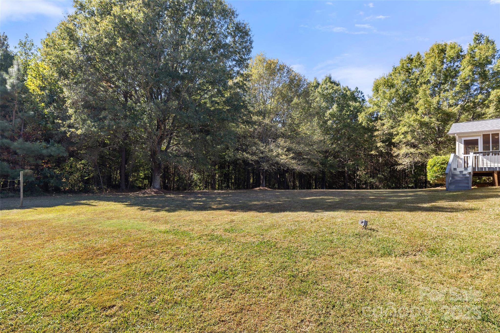 5303 Rogers Road Monroe, NC 28110 - Photo 36 of 45 a view of a swimming pool with an outdoor seating