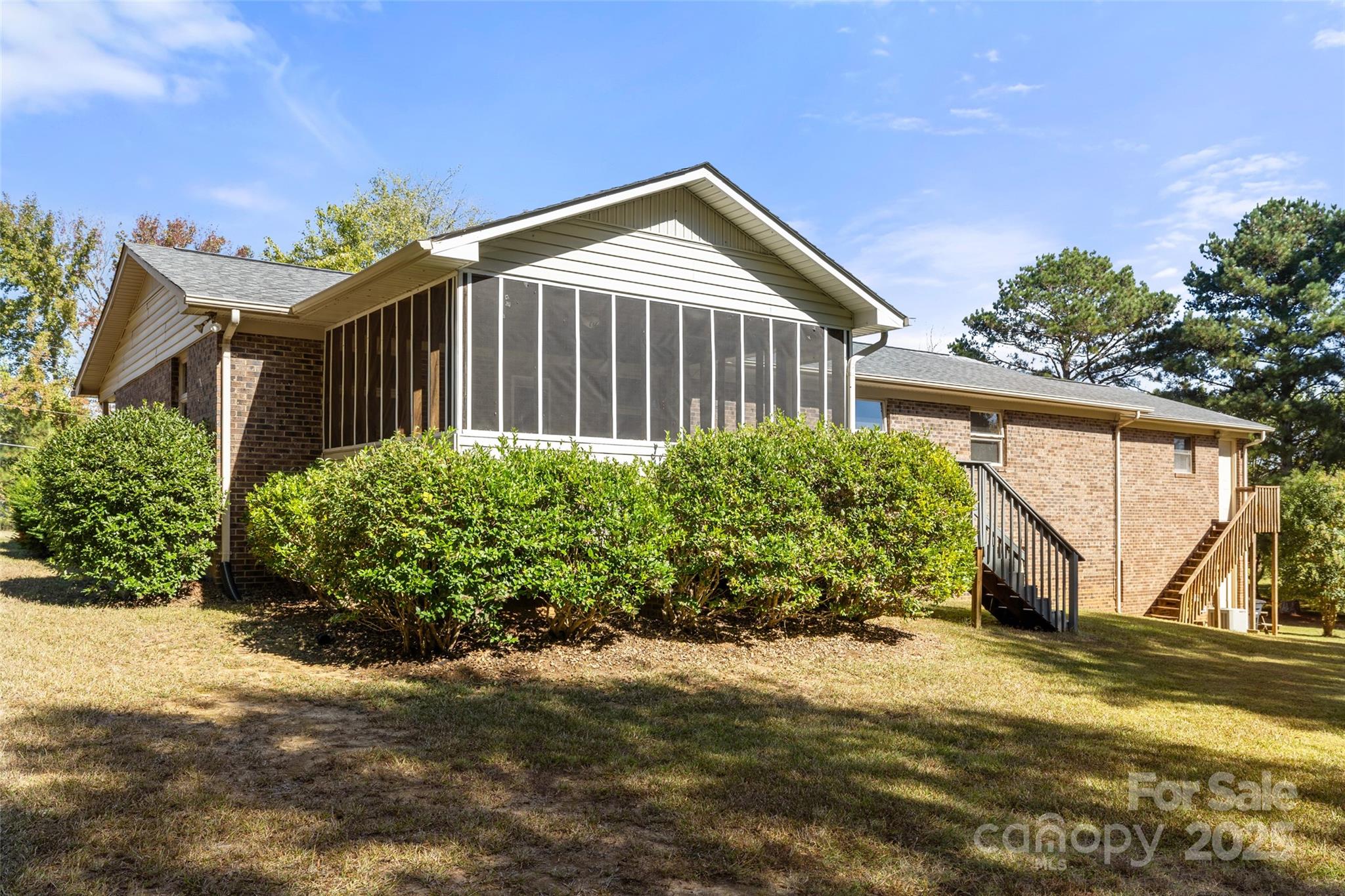 5303 Rogers Road Monroe, NC 28110 - Photo 41 of 45 a view of a house with a yard and plants