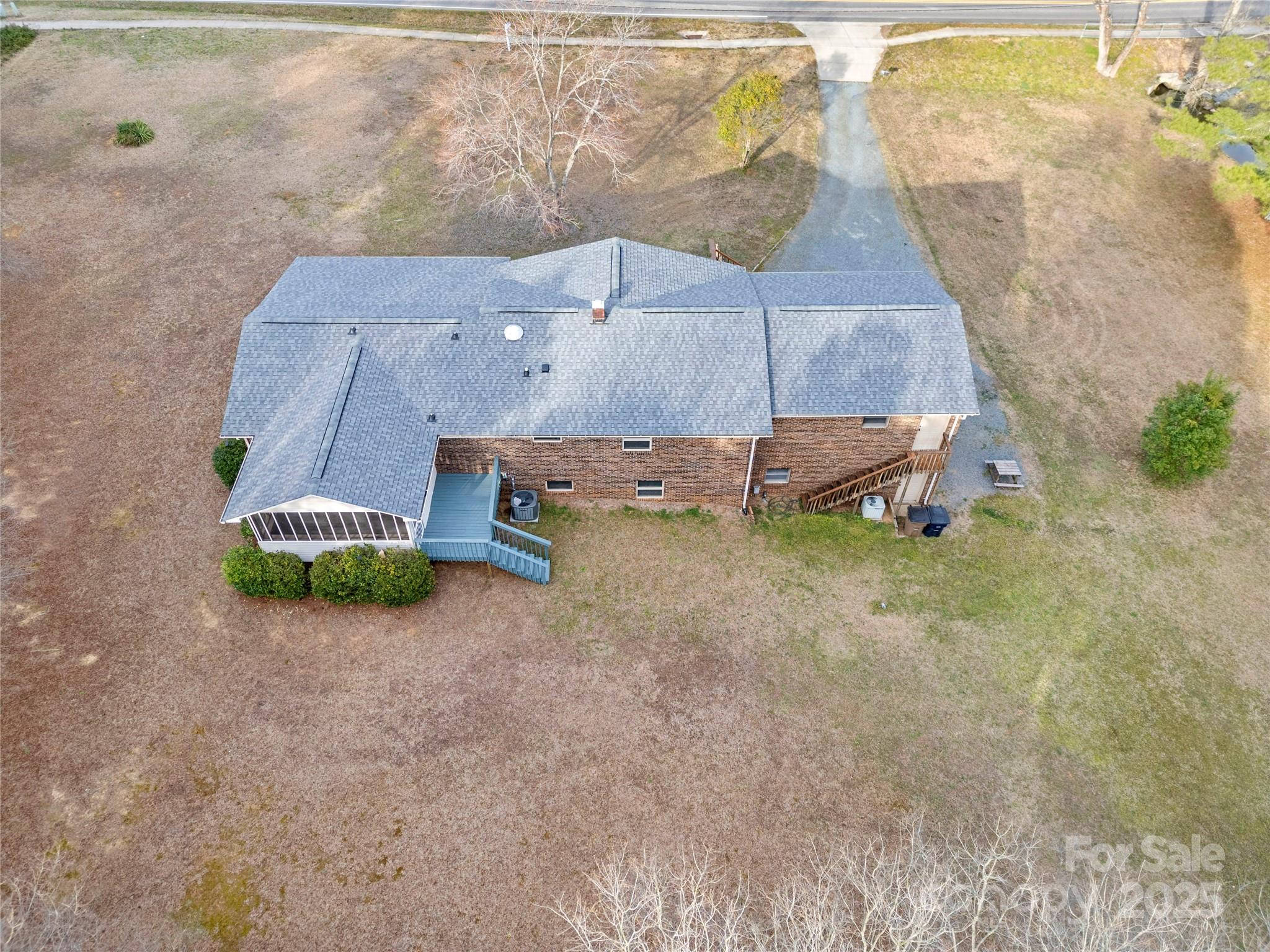 5303 Rogers Road Monroe, NC 28110 - Photo 42 of 45 a backyard of a house with barbeque oven